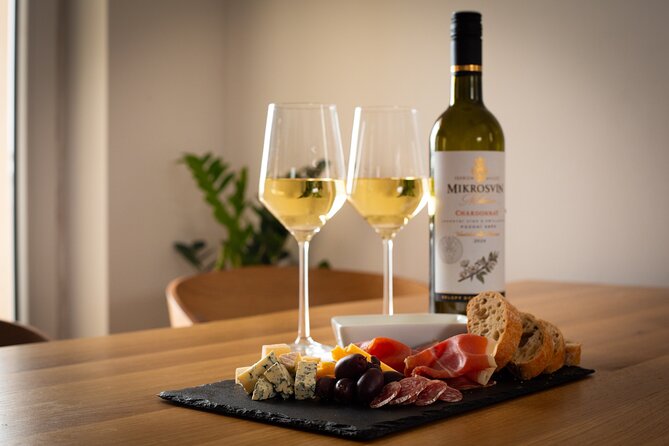 2.5-Hour Prague Wine Tasting Walking Tour - The wine bar experience: snacks, atmosphere, and possible bottle shopping