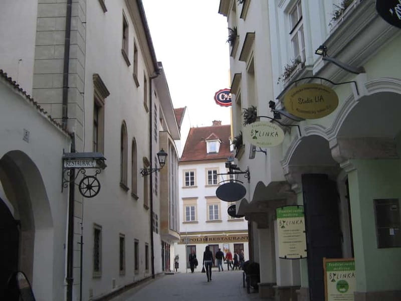 Brno: Historic Downtown Walking Tour - St. James Church and the Tip to Look Up