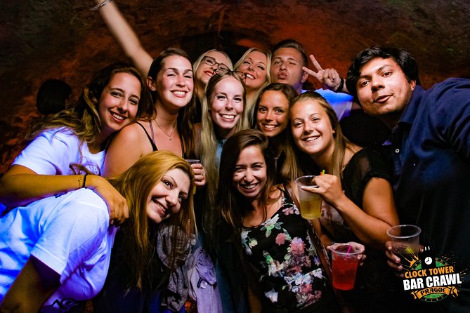 Clock Tower Bar Crawl ending at Prague's BIGGEST rooftop CLUB - Two to three local stops with welcome shots, then the big finish