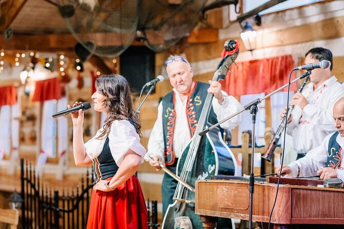 Folk Dinner Experience in Prague with Transportation - The Folklore Show: Costumes, Singing, Dancing, and Audience Participation