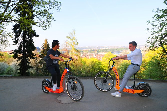 Grand City Tour of Prague on Cruiser e-Bikes or e-Scooters - Lennonova zeď and Charles Bridge for the classic Prague photo hits