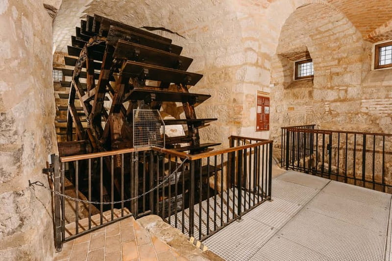 Pilsen: Historic Underground Tour with a Glass of Beer - Passageways, wells, and the shift from food storage to brewing