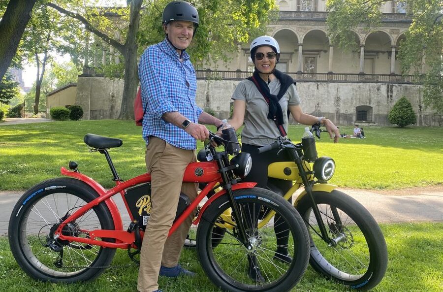 Prague: 10 Must-See Landmarks & Viewpoints on E-Bike Tour - John Lennon Wall, Polaroid souvenir, and the best kind of momentum