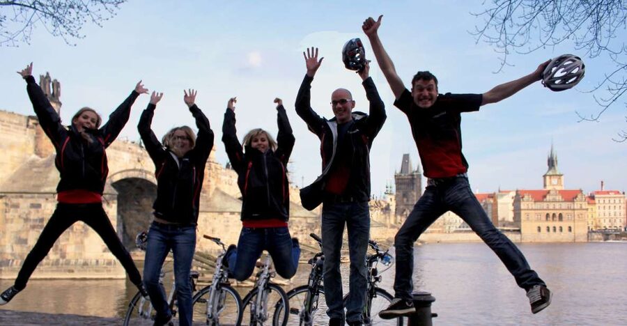 Prague: Bike or E-Bike City Tour with A Local Guide - Prague Castle area and Strahov Monastery, seen from the move