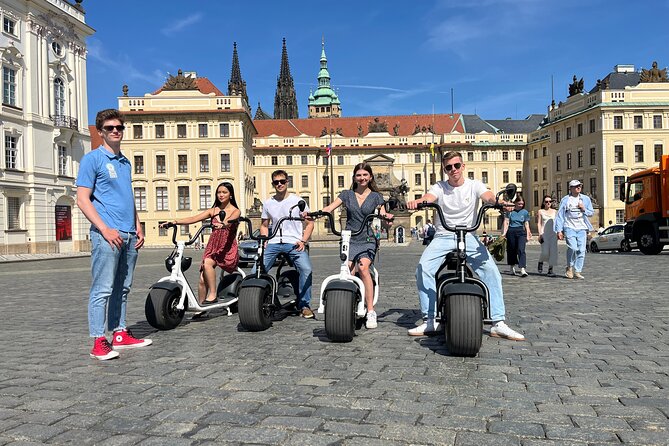 Prague Fat Tire E-Scooter Tour with A Local Guide - Entering the ride at Grandior, with hands-on scooter basics