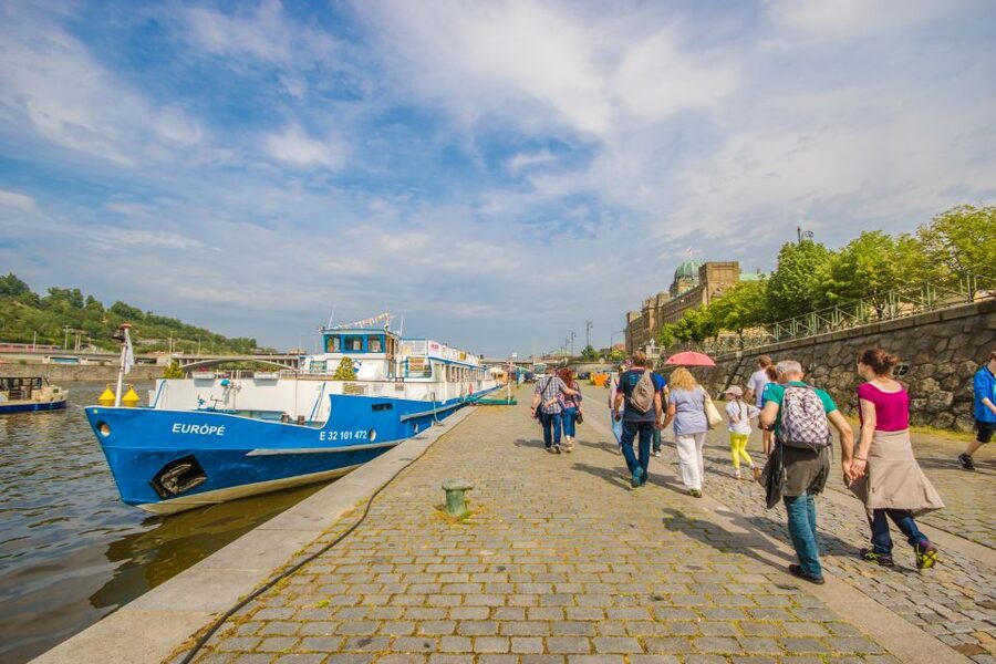 Prague: Guided Bus & Walking Tour with River Cruise & Lunch - The Vltava cruise with glass roof, views, and buffet lunch