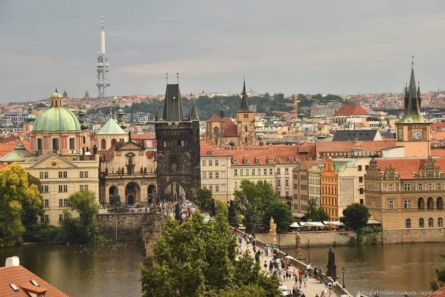 Prague: Hidden Gems Walking Tour with Local Guide - Charles Bridge and scenic views, plus the narrow-street contrast