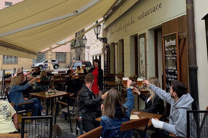 Prague Historic Pub Tour with Drinks Included - Charles Bridge Route: Jewish Quarter Streets, Theatre Stops, and Photos