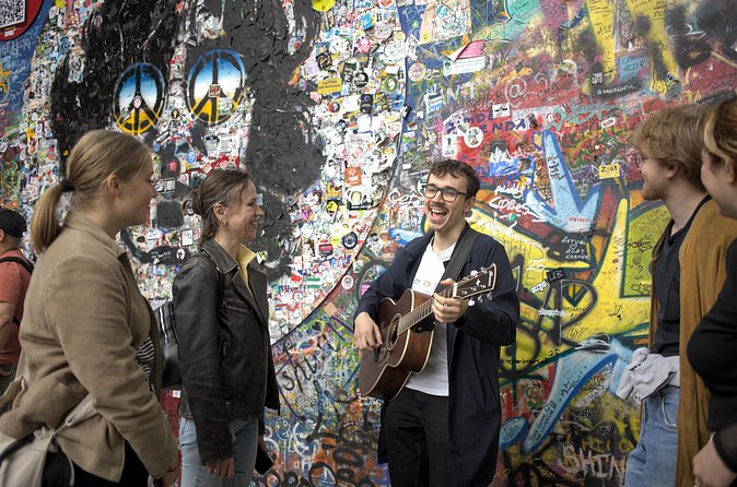 Prague: Mozart, Dvořák, Czech Folk Tour with a Guitarist - John Lennon Wall finale: Imagine on guitar and what Czech freedom cost