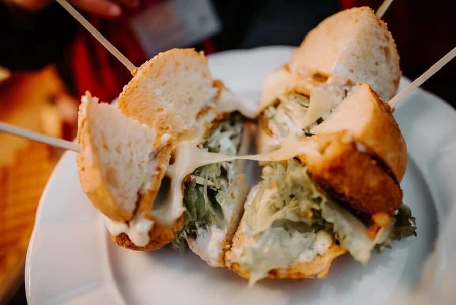Prague: Old Town Fun Evening Food and Drink Tour - Two sit-down dinner moments: classic Czech comfort and modern twists