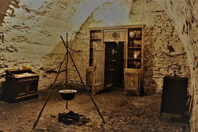 Prague Old Town, Medieval Underground and Dungeon Historical Tour - The dungeon area and torture instruments, handled with context