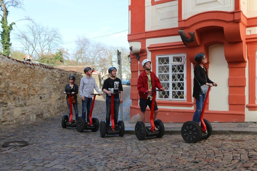 Prague Segway Tour with Oldest Monasteries and Free Taxi - Equipment and comfort: helmet, optional raincoat, and real-world surfaces