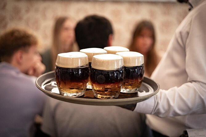 Prague Snack & Stroll: Private Food Tour with Your Local Buddy - Štvanická lávka: a modern bridge with a Prague skyline view
