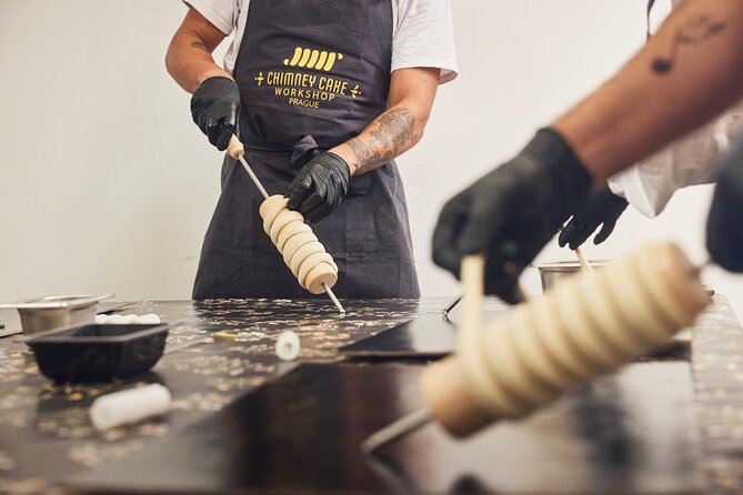 Prague: Traditional Chimney Cake (Trdelník) Making Workshop - The toppings part is where your cake becomes your own