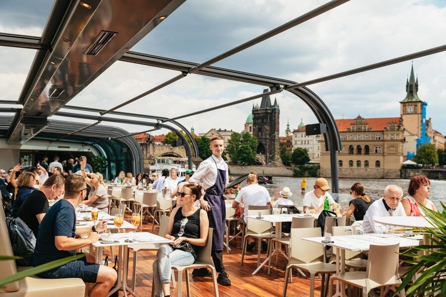 Prague: Vltava River Lunch Cruise in an Open-Top Glass Boat - The aperitif, accordion music, and the onboard rhythm