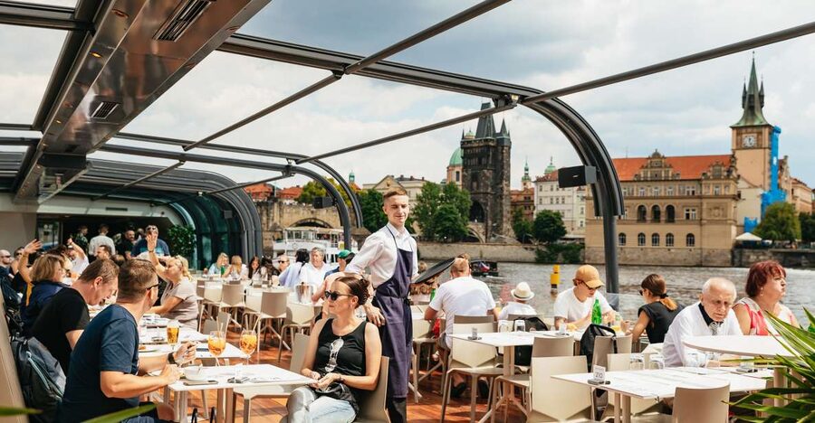 Prague: Vltava River Lunch Cruise in an Open-Top Glass Boat - Charles Bridge from the water: statues, angles, and the best photo moments