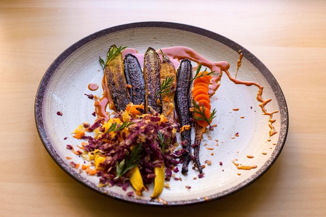 Savor 10 Course Dinner in Chef’s Kitchen - Group size, conversation level, and what the room feels like
